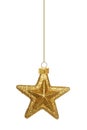 Hanging gold star Christmas ornament over white Royalty Free Stock Photo