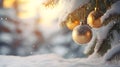 Hanging golden Christmas balls on spruce and fir branches with snow covered surface. Royalty Free Stock Photo