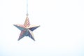 Hanging a golden Christmas star. Ornament decoration in home Royalty Free Stock Photo