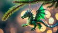 Hanging gracefully on the Christmas tree is a charming and cosy ornament - a lively green dragon with shimmering scales Royalty Free Stock Photo