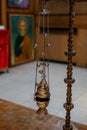 Hanging icon lamp in orthodox church. Orthodox icon lamp. Church attribute. Lamp stand Church