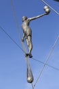 Hanging iron figures balancing on ropes on footbridge Bernatka,Krakow, Poland