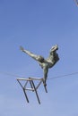 Hanging iron figures balancing on ropes on footbridge Bernatka,Krakow, Poland