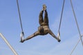 Hanging iron figures balancing on ropes on footbridge Bernatka,Krakow, Poland