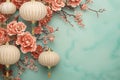 Hanging lantern traditional Asian decor on light blue background with pink flowers Royalty Free Stock Photo