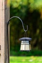 Hanging Lantern on Wooden Post