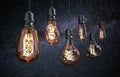 Hanging LED Edison lightbulbs on black background. 3D illustration Royalty Free Stock Photo