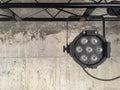 Hanging led light spot over grey dark concrete Royalty Free Stock Photo