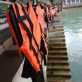 Hanging life jacket on the rope
