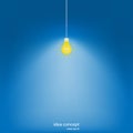 Hanging light bulb one over dark blue background Royalty Free Stock Photo