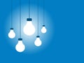 Hanging Light Bulbs on a Blue Background