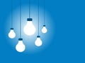 Hanging Light Bulbs on a Blue Background Royalty Free Stock Photo