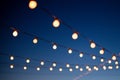 Hanging lights at night Royalty Free Stock Photo