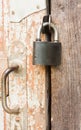 Hanging lock on an old wooden door Royalty Free Stock Photo