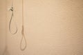 Hanging loop suicide tool object with shadow on concrete texture simple background pattern space for copy or your text Royalty Free Stock Photo