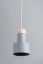 Hanging metal gray lamp with wooden part