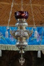 Orthodox church. Silver hanging oil lamp - Bujoreni Monastery, landmark attraction in Romania Royalty Free Stock Photo