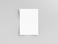 Hanging paper or pasteboard on a white wall for Information, display or schedule. 3D Illustration.