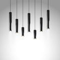 Hanging pendant tube shaped lamps. Contemporary style interior light. Chandelier with black metal cylindrical lampshade Royalty Free Stock Photo