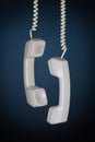 Hanging Phone Receivers Royalty Free Stock Photo