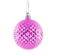 Hanging pink shiny Christmas bauble isolated on white background. Royalty Free Stock Photo