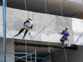 Hanging plasterers Royalty Free Stock Photo