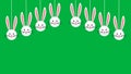 hanging rabbit face on green background Royalty Free Stock Photo