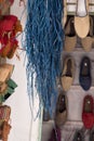 Hanging rafia waiting to be woven into shoes Royalty Free Stock Photo