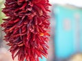 Hanging Red Chili Peppers drying at farmers market in southwest New Mexico USA Royalty Free Stock Photo