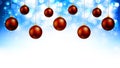 Hanging red Christmas balls on a shiny blue background bokeh Royalty Free Stock Photo