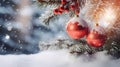 Hanging red Christmas balls on spruce and fir branches with snow covered surface. Royalty Free Stock Photo