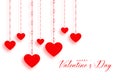 Hanging red hearts on white valentines day background Royalty Free Stock Photo