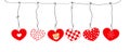 Hanging red nordic hearts Happy Valentine`s day or Merry Christmas greeting card Royalty Free Stock Photo