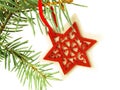 Hanging red star on Christmas tree Royalty Free Stock Photo