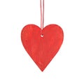 Hanging red wooden heart. Christmas ornament isolated on a white background. Royalty Free Stock Photo