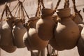 Hanging rough clay jars Royalty Free Stock Photo