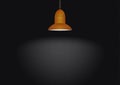 Hanging shining orange lamp on black background