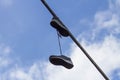 Hanging shoes Royalty Free Stock Photo