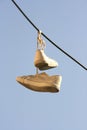 Hanging shoes on a rope Royalty Free Stock Photo