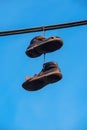 Hanging shoes Royalty Free Stock Photo