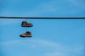 Hanging shoes Royalty Free Stock Photo