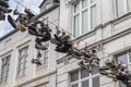 Hanging shoes at a wire in the old town of Flensburg in northern Germany Royalty Free Stock Photo