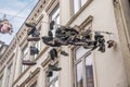 Hanging shoes at a wire in the old town of Flensburg in northern Germany Royalty Free Stock Photo