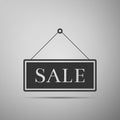 Hanging sign with text Sale icon isolated on grey background Royalty Free Stock Photo