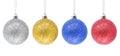 Hanging silver, golden, blue, red glitter Christmas baubles isolated a on white background. Royalty Free Stock Photo