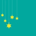 Hanging stars on green background Royalty Free Stock Photo