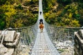 Hanging suspension bridge in himalaya Nepal Royalty Free Stock Photo