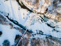 Hanging Suspention Bridge over Frozen San River in Bieszczady Mountains, Poland Royalty Free Stock Photo