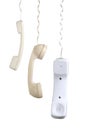 Hanging Telephone Receivers Royalty Free Stock Photo