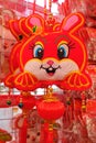 A hanging toy in the shape of a smiling Bunny for sale at a bazaar to usher in the Chinese New Year of the Rabbit 2023